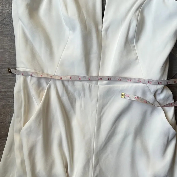 NEW Dessy Collection STRAPLESS NOTCH CREPE JUMPSUIT WITH POCKETS IN IVORY - Picture 9 of 10